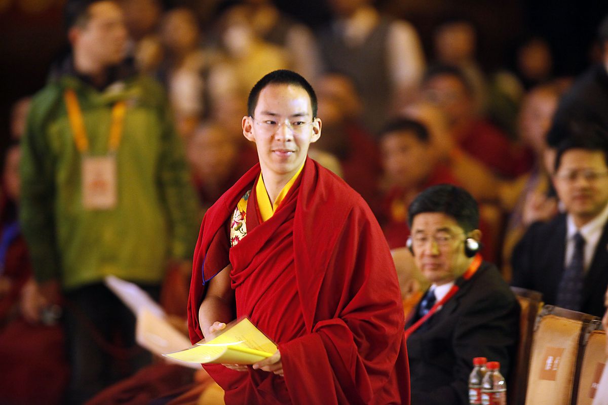 The Panchen Lama prepares to deliver a speech Saturday at the opening of the World Buddhist Forum  in Wuxi, China,  a gathering of monks, nuns and scholars from more than 50 countries. (Eugene Hoshiko / The Spokesman-Review)