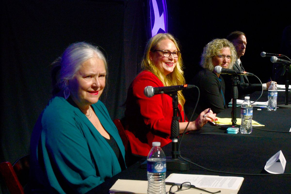 Left to right, Deb Conklin, Stephanie Olsen, Stefanie Collins and Larry Haskell give introductions at The Spokesman-Review’s Northwest Passages forum Thursday in the Montvale Event Center.  (Liz Kishimoto/The Spokesman-Review)