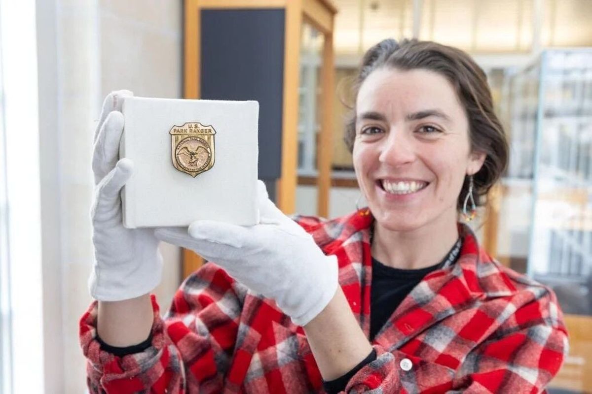 The "Women in Yellowstone" temporary exhibit at the Heritage and Research Center includes this park ranger badge.  (Jacob W. Frank/National Park Service)