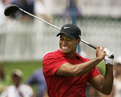 
Many shots during the U.S. Open left Tiger Woods grimacing. Associated Press
 (Associated Press / The Spokesman-Review)