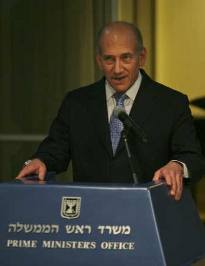 
Israeli Prime Minister Ehud Olmert talks to members of the media during a news conference at his residence in Jerusalem. Associated Press
 (Associated Press / The Spokesman-Review)