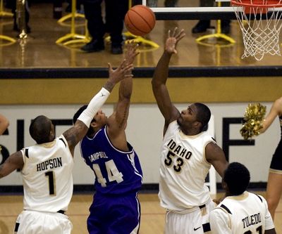 Idaho center Marvin Jefferson (53) blocks the shot attempt of Portland guard T.J. Campbell (44) as Mac Hopson (1) tries to help on defense during the second half of an NCAA college basketball game Sunday, Dec. 6, 2009, at Memorial Gym in Moscow, Idaho. Campbell was held to three points on 1-of-11 shooting from the field. Idaho won 68-48. (Dean Hare / Fr158448 Ap)