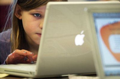 
Victoria Duke, a third-grader at Brentwood Elementary School, logs on to a  Web site to work on a reading comprehension program Monday. A levy that  would have raised money  for technology in the Mead School District failed, so the schools will have to make do with  existing equipment. 
 (Kathryn Stevens / The Spokesman-Review)