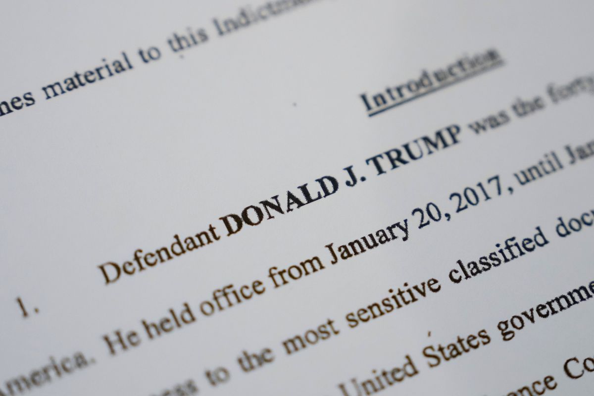 WASHINGTON, DC – JUNE 9: In this photo illustration, pages are viewed from the unsealed federal indictment of former U.S. President Donald Trump on June 9, 2023 in Washington, DC. Former U.S. President Donald Trump has been indicted on 37 felony counts in Special Counsel Jack Smith’s classified documents probe. (Photo Illustration by Drew Angerer/Getty Images)  (Drew Angerer)