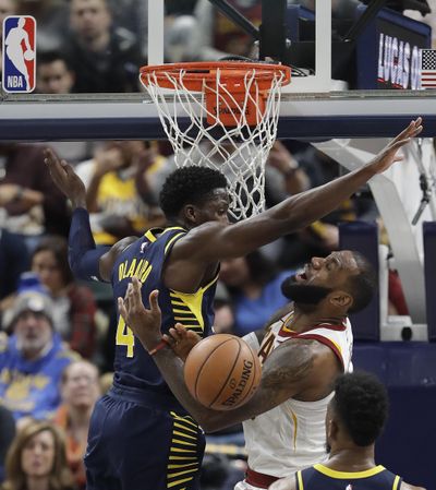 Cleveland Cavaliers’ LeBron James is fouled by Indiana Pacers’ Victor Oladipo as he goes up for a shot during the second half of an NBA basketball game Friday, Dec. 8, 2017, in Indianapolis. The Pacers won 106-102. (Darron Cummings / Associated Press)
