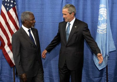 
President Bush, right, gestures for U.N. Secretary-General Kofi Annan to pass after a photo opportunity at U.N. headquarters Tuesday. Bush is on hand to attend the United Nations World Summit this week. 
 (Associated Press / The Spokesman-Review)