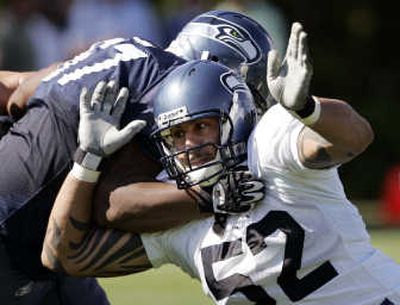 
Defensive end Jason Babin, right, is hoping to make his season debut Sunday after being acquired from Houston. Associated Press
 (Associated Press / The Spokesman-Review)