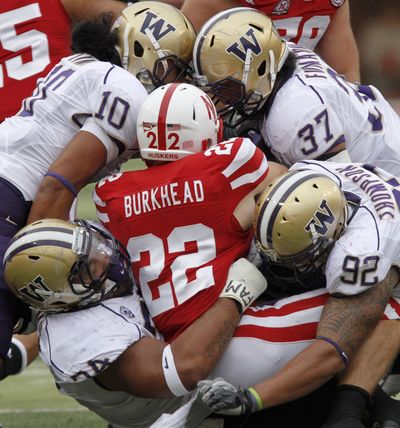 Everette Thompson (92) and the UW defense are going to have to gang up on Baylor like they did at times against Nebraska. (Associated Press)