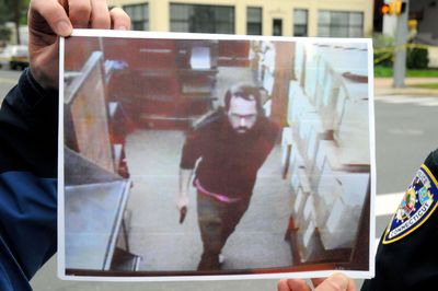 This surveillance photo is of the alleged gunman in the killing of a Wesleyan University student Wednesday in a book store in Middletown, Conn.  (Associated Press / The Spokesman-Review)