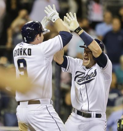 Chris Denorfia, right, and Jedd Gyorko celebrate victory. (Associated Press)