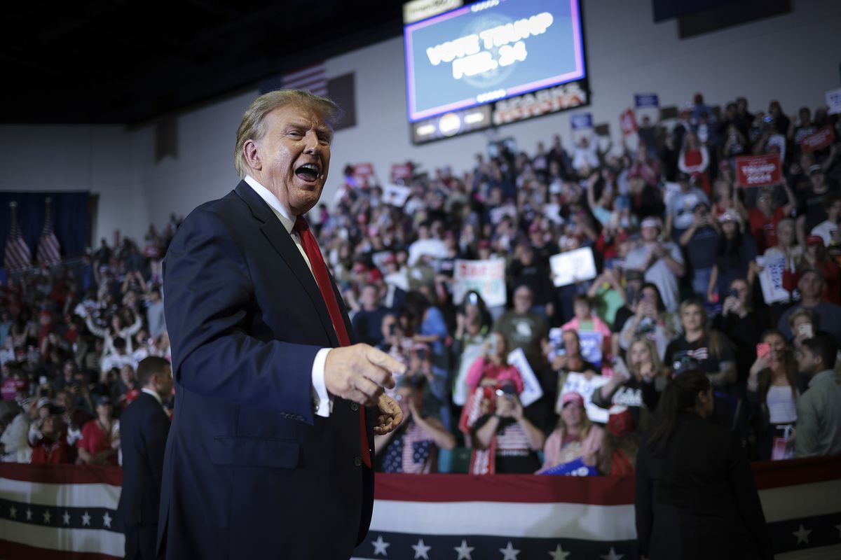 Republican presidential candidate and former President Donald Trump gestures to members of the audience as he leaves a Get Out the Vote rally at Coastal Carolina University on Saturday in Conway, S.C.  (Win McNamee)