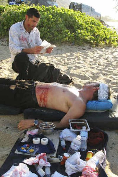 
Matthew Fox, left, and Frederic Lane appear in a scene from ABC's 