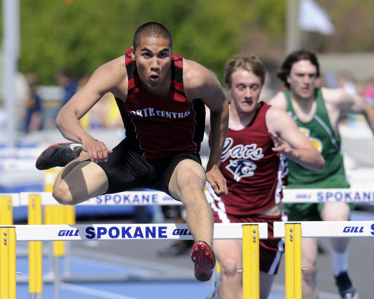 North Central’s DeSean Svastisalee leads the pack during preliminaries in the District 8 3A boys 110-meter hurdles at Spokane Falls Community College.