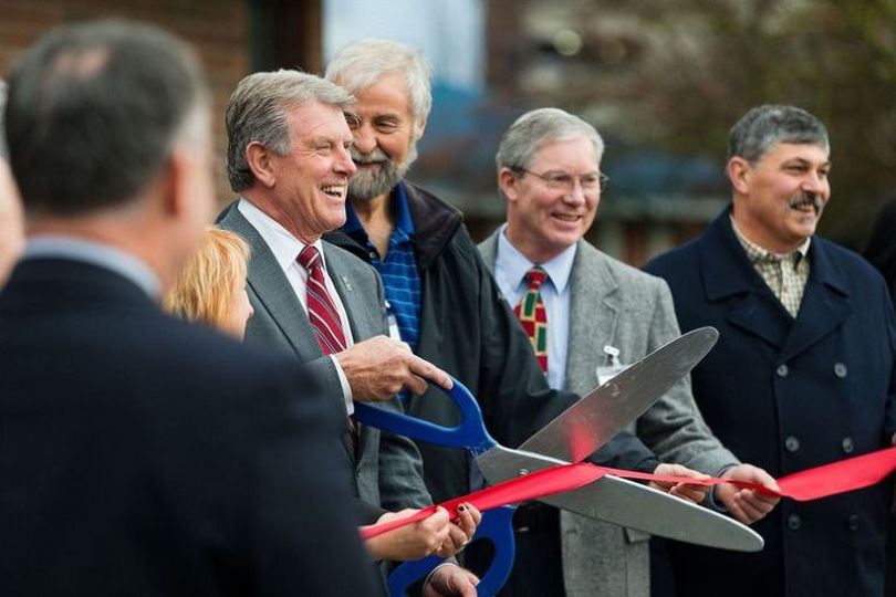 Gov. Butch Otter jokingly begins a countdown at 99 during a ribbon-cutting for the Northern Idaho Crisis Center on Tuesday in Coeur d’Alene. (Shawn Gust / Coeur d'Alene Press)