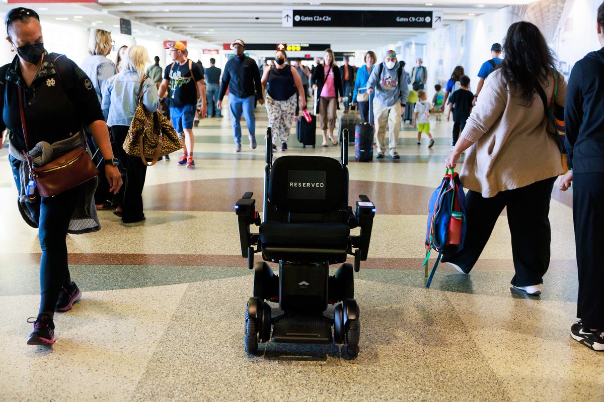 An autonomous wheelchair travels through Seattle-Tacoma International Airport after transporting a person to a gate on Oct. 3, 2024.   (Erika Schultz/The Seattle Times/TNS)