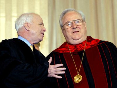 
Sen. John McCain, R-Ariz., left, and the Rev. Jerry Falwell, chancellor of Liberty University chat as Liberty University's commencement begins, in Lynchburg, Va., Saturday. 
 (Associated Press / The Spokesman-Review)