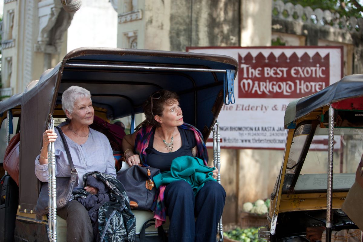 Judi Dench, left, and Celia Imrie are shown in a scene from “The Best Exotic Marigold Hotel.”