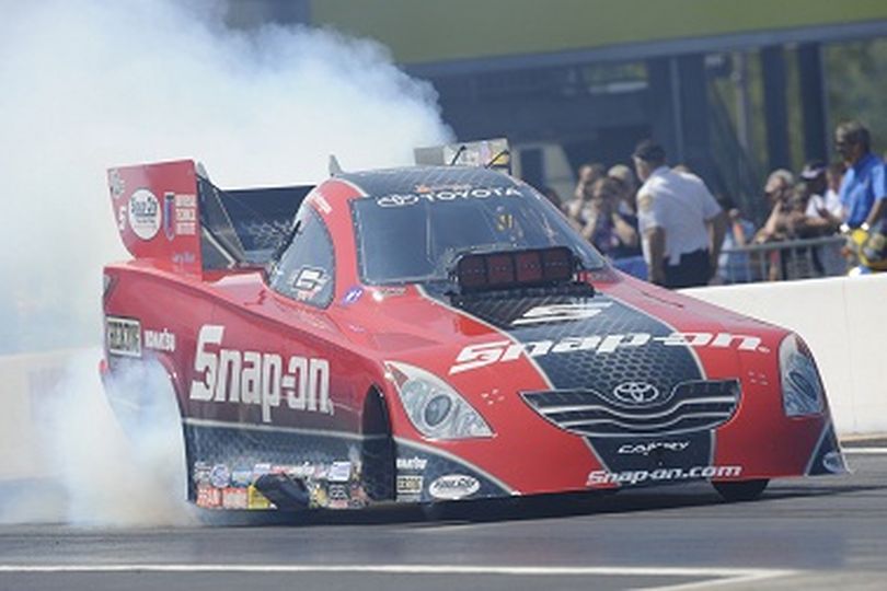 Cruz Pendregon roars to the top spot in NHRA Funny Car qualifying at Charlotte. (Photo courtesy of NHRA)