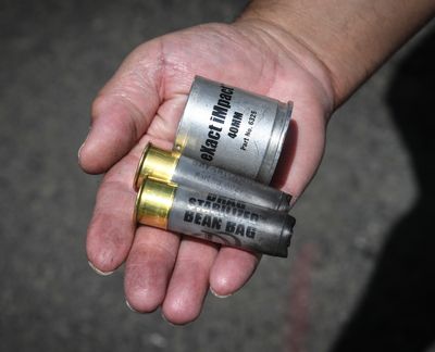 Police bean bag and eXact iMpact shells were found on the ground May 31, 2020 in downtown Spokane after protesters flooded the streets in response to the killing of George Floyd in Minneapolis.  (DAN PELLE/THE SPOKESMAN-REVIEW)
