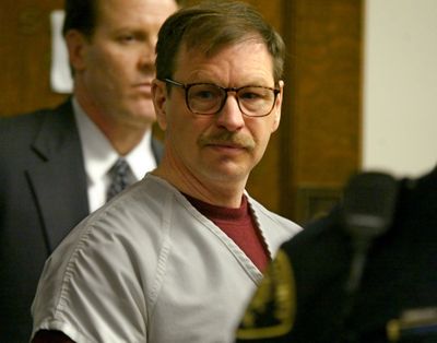 Gary Ridgway prepares to leave the courtroom where he was sentenced in King County Washington Superior Court Dec. 18, 2003, in Seattle. Ridgway received 48 life sentences, without the possibility of parole, for killing 48 women over the previous 20 years in the Green River Killer serial murder case.  (Johh Trujillo)