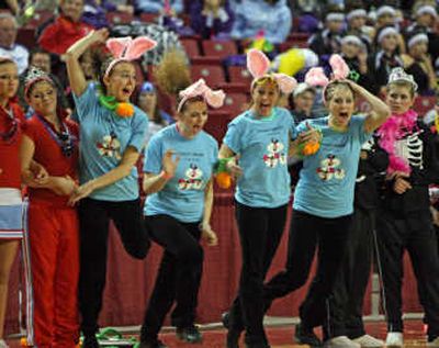 
E-Gal team leaders, from left, Olivia Bergman, Peyton Boone, Lexi Spies and Stephanie Guttromson celebrate as it is announced they are the 2A State Hip-Hop Champions during the Washington Interscholastic Activities Association Dance Team State Championship in Yakima. Courtesy of Jodee A. Cahalan
 (Courtesy of Jodee A. Cahalan / The Spokesman-Review)