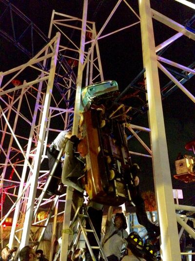 This photo provided by the Daytona Beach Fire department shows emergency crews working on a roller coaster car that derailed at the Daytona Beach Boardwalk on Thursday, June 14, 2018, in Daytona Beach, Fla. Two passengers fell 34 feet to the ground and authorities had to pull eight others to safety. The accident is under investigation according Daytona Beach Fire spokeswoman Sasha Staton. (AP)