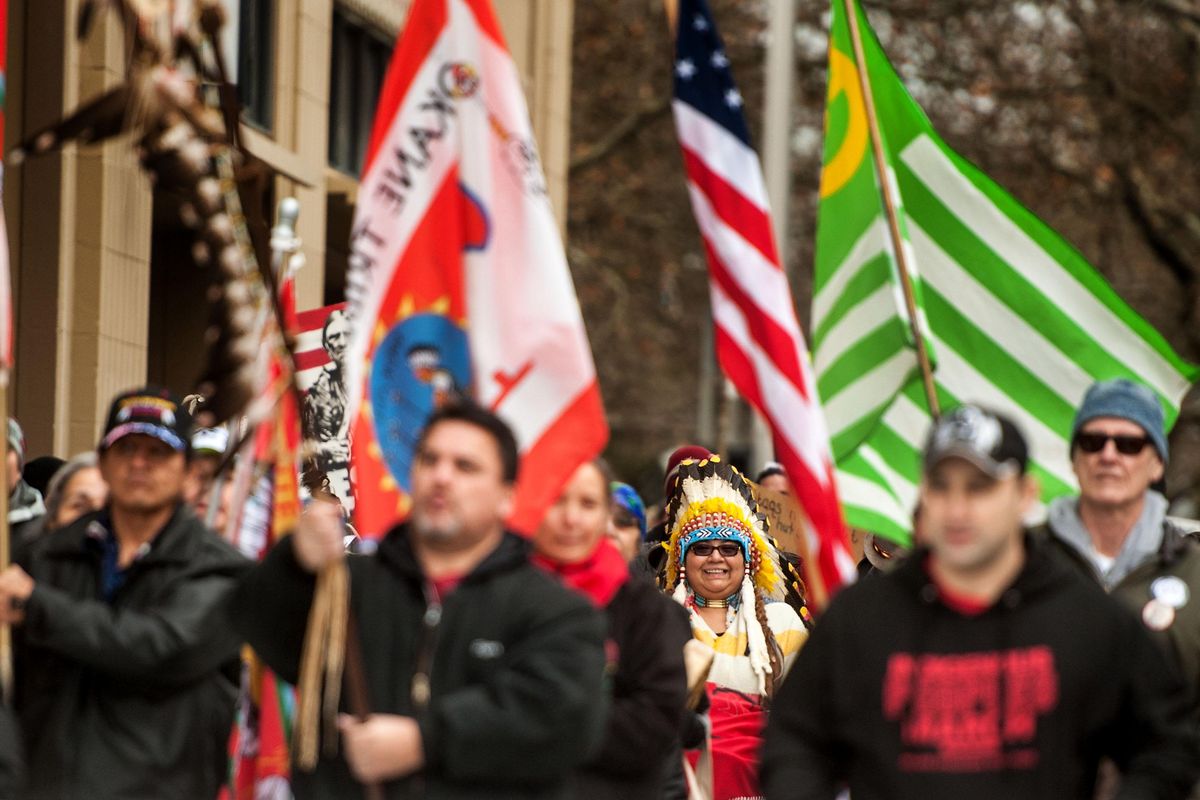 Debra Rattler, center, participates in the Indigenous Peoples Day march in downtown Spokane on Friday, Jan. 18, 2019. (Kathy Plonka / The Spokesman-Review)