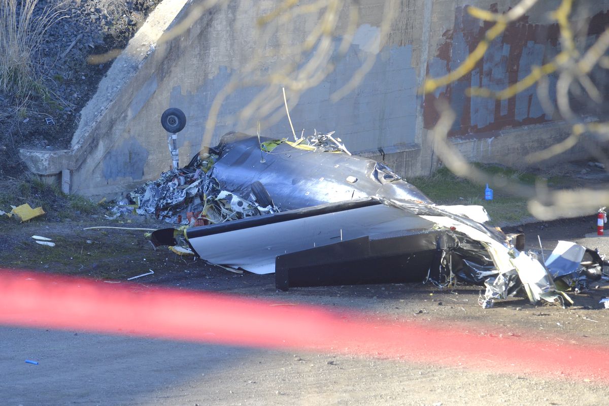 Wreckage of a single-engine airplane that crashed east of downtown Spokane shortly after it took off from Felts Field.  (Jesse Tinsley)