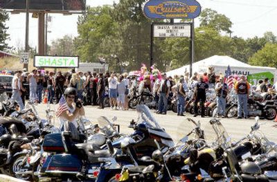 
Motorcycles line Seltice Way in front of Cruiser's bar in Stateline on Sunday during a benefit for Shasta Groene, 8, who survived a brutal homicide scene and kidnapping.
 (Tom Davenport photos/ / The Spokesman-Review)