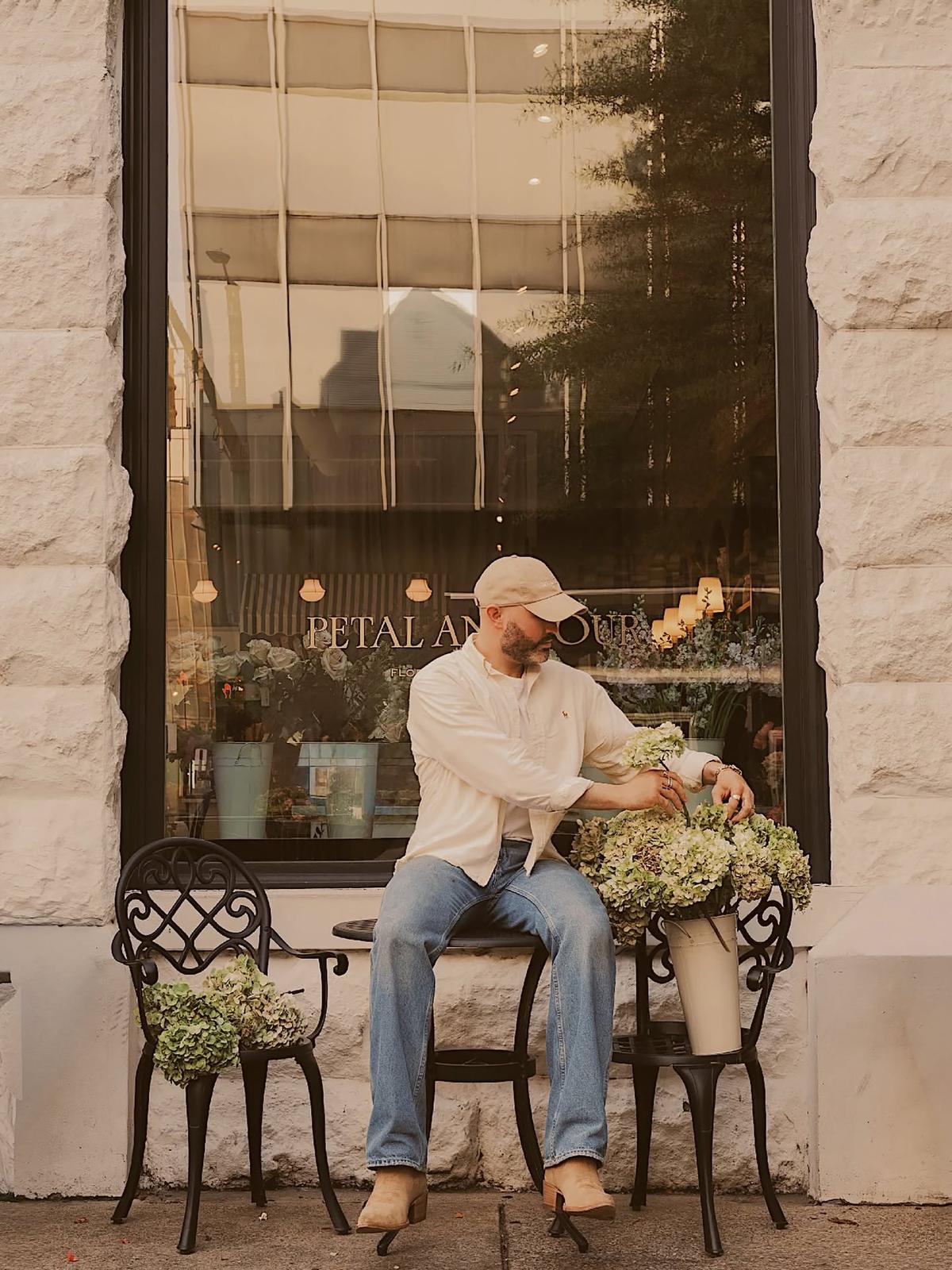 Owner Keegan Chitwood, sitting outside of Petal and Pour. (Ansley Suddeth Photography/TNS) (NICKELL/TNS)
