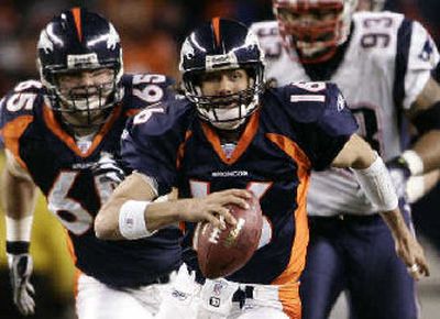 
Quarterback Jake Plummer is coming off his first playoff win with the Broncos. 
 (Associated Press / The Spokesman-Review)