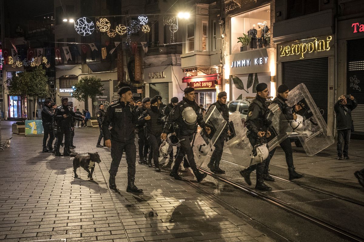 Turkish authorities secure a street near Taksim Square, one of the city’s busiest areas, after an explosion in Istanbul, Turkey, on Sunday.  (SERGEY PONOMAREV)
