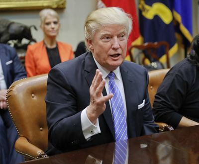 President Donald Trump gestures during his meeting with labor leaders in the Roosevelt Room of the White House in Washington, Monday, Jan. 23, 2017. (Pablo Martinez Monsivais / Associated Press)