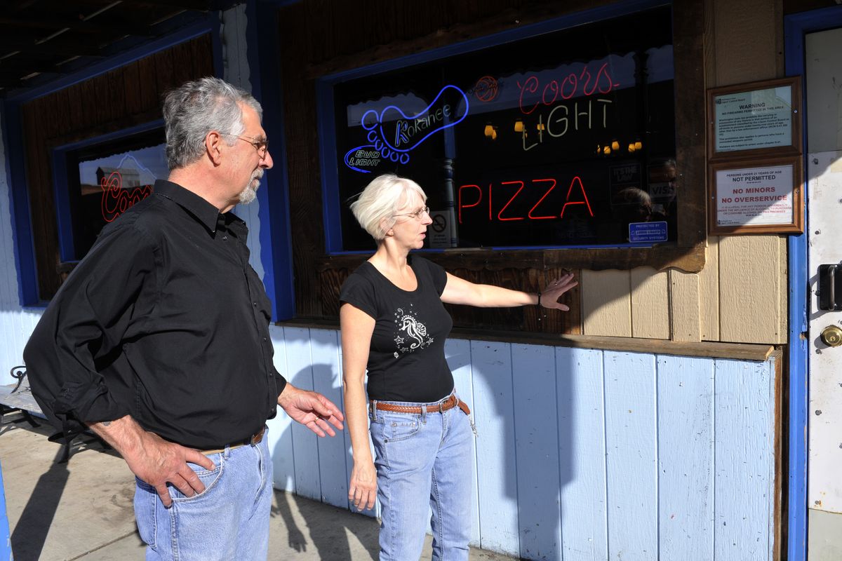 Jim Porter and his wife, Debbie, owners of the Brass Rail Tavern in Rosalia, Wash., are thankful Pat Conley, a Spokesman-Review newspaper carrier, spotted an early morning fire in a planter box and called the fire department. (Colin Mulvany)