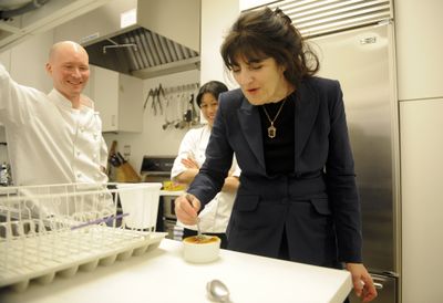 Associated Press Gourmet magazine editor Ruth Reichl, right, tastes an avocado crème brulee created by chefs Ian Knauer, left, and Kay Chun, in the magazine’s kitchen in New York last month. (Associated Press / The Spokesman-Review)