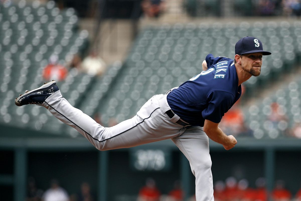 Seattle Mariners starting pitcher Mike Leake follows through on a pitch to the Baltimore Orioles in the first inning of a baseball game, Thursday, June 28, 2018, in Baltimore. (Patrick Semansky / Associated Press)