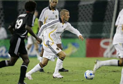 
David Beckham said he found the soggy turf to his liking. Associated Press
 (Associated Press / The Spokesman-Review)