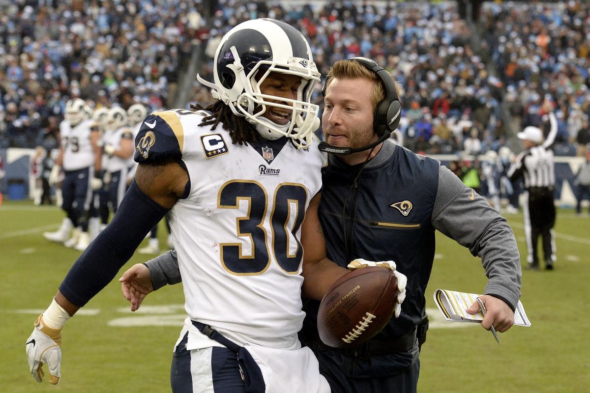 Los Angeles Rams running back Todd Gurley (30) is congratulated by head coach Sean McVay after Gurley scored a touchdown against the Tennessee Titans on an 80-yard pass reception  on Dec. 24, 2017, in Nashville, Tennessee. (Mark Zaleski / AP)