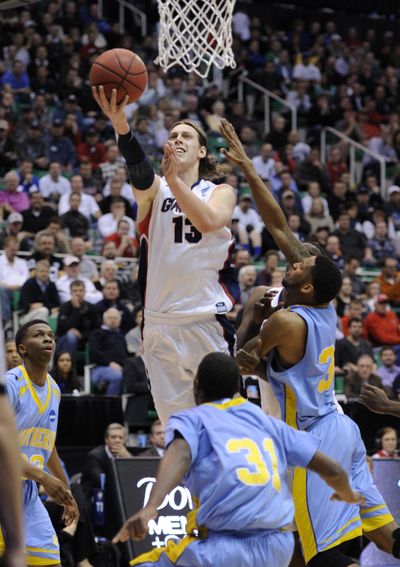 Gonzaga’s Kelly Olynyk tries to score as Southern’s Brandon Moore, right, elevates to defend. (Colin Mulvany)