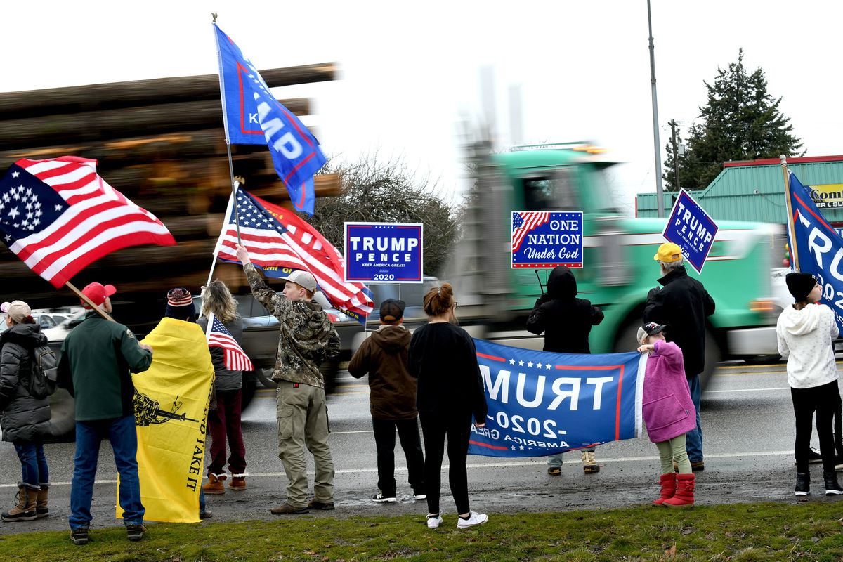 A crowd of President Trump supporters protest the election results in Coeur d’Alene on Wednesday, Jan. 6, 2021.  (Kathy Plonka/The Spokesman-Review)