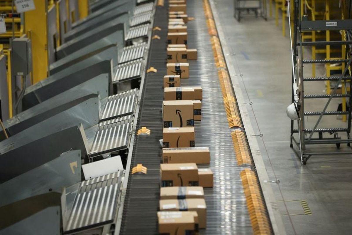 Packages travel on a conveyor at the Amazon’s fulfillment center on Nov. 27, 2023, in Robbinsville, N.J. (Reuters)