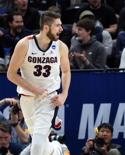 Gonzaga forward Killian Tillie (33) celebrates a dunk during the second half of a first round men's college basketball game in the NCAA tournament, Thurs., March 21, 2019, in Salt Lake City. (Colin Mulvany / The Spokesman-Review)