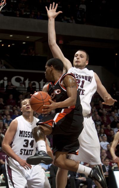Pacific’s Demetrece Young looks for an opening during Missouri State’s 78-65 win in the CollegeInsider.com tournament final.  (Associated Press)