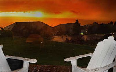 
A spring thunderstorm blows through Spokane on Wednesday evening, bringing rain, hail and lightning at sunset. 
 (CHRISTOPHER ANDERSON / The Spokesman-Review)