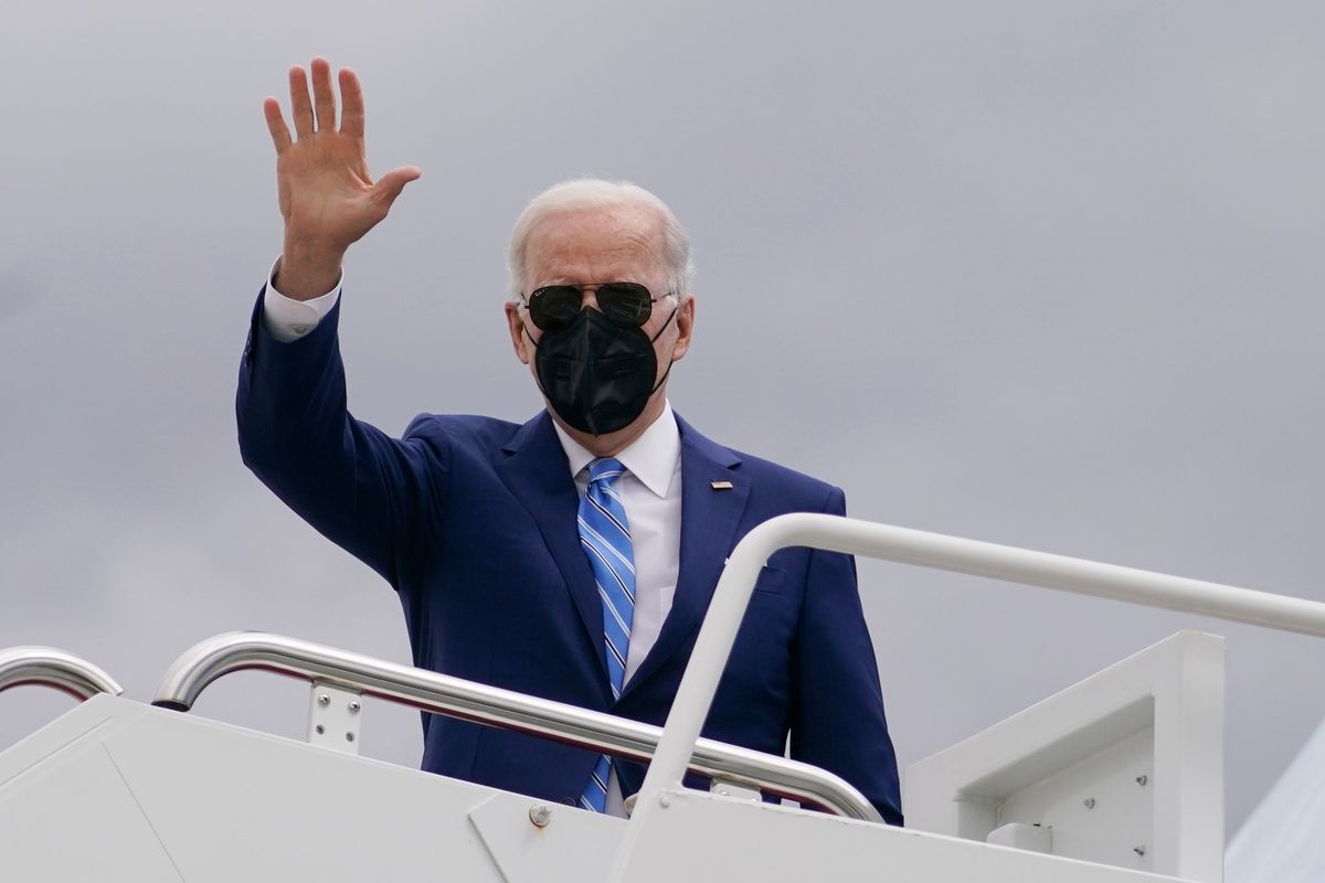 President Joe Biden boards Air Force One in Andrews Air Force Base, Md., Tuesday, April 12, 2022, en route to Menlo, Iowa.  (Carolyn Kaster)