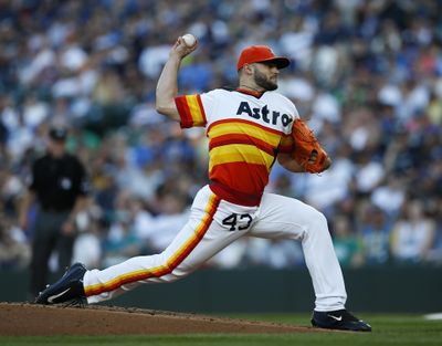 Houston Astros starting pitcher Lance McCullers Jr. throws to the Seattle Mariners on June 24 in Seattle. (Jason Redmond / AP)