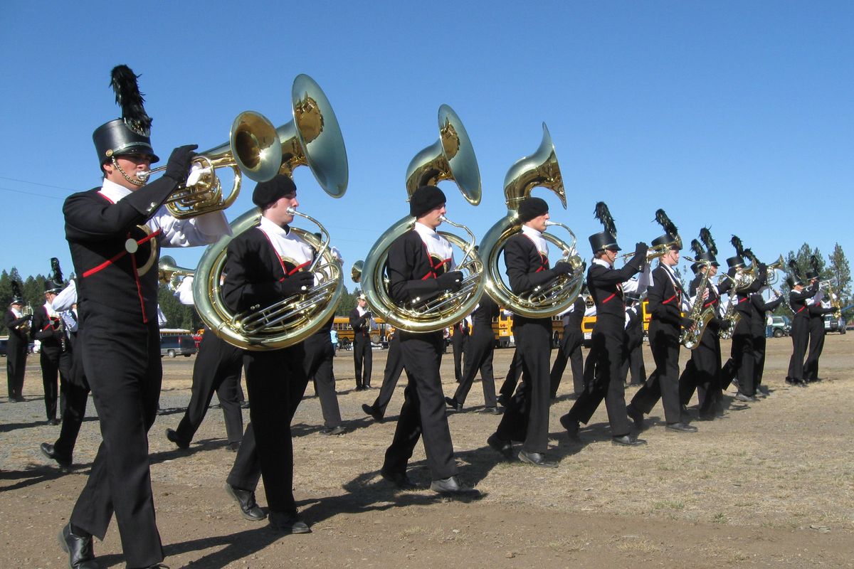 lisal@spokesman.com Brass players from Mt. Spokane High School practice before the start of the Pacific Northwest Marching Band Championships on Saturday at Joe Albi Stadium. (photos by LISA LEINBERGER / The Spokesman-Review)