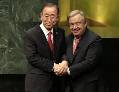 Current Secretary-General Ban Ki-moon, left, clasps hands with U.N. Secretary-General designate Antonio Guterres after Guterres was sworn in at U.N. headquarters, Monday, Dec. 12, 2016. (Seth Wenig / Associated Press)