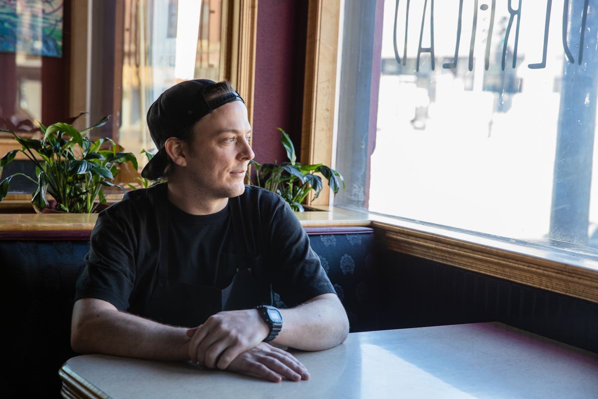 Chowderhead chef and owner Travis Tveit looks out a window at his new restaurant at 825 N. Monroe St. on March 12.  (Courtesy of Ari Nordhagen)