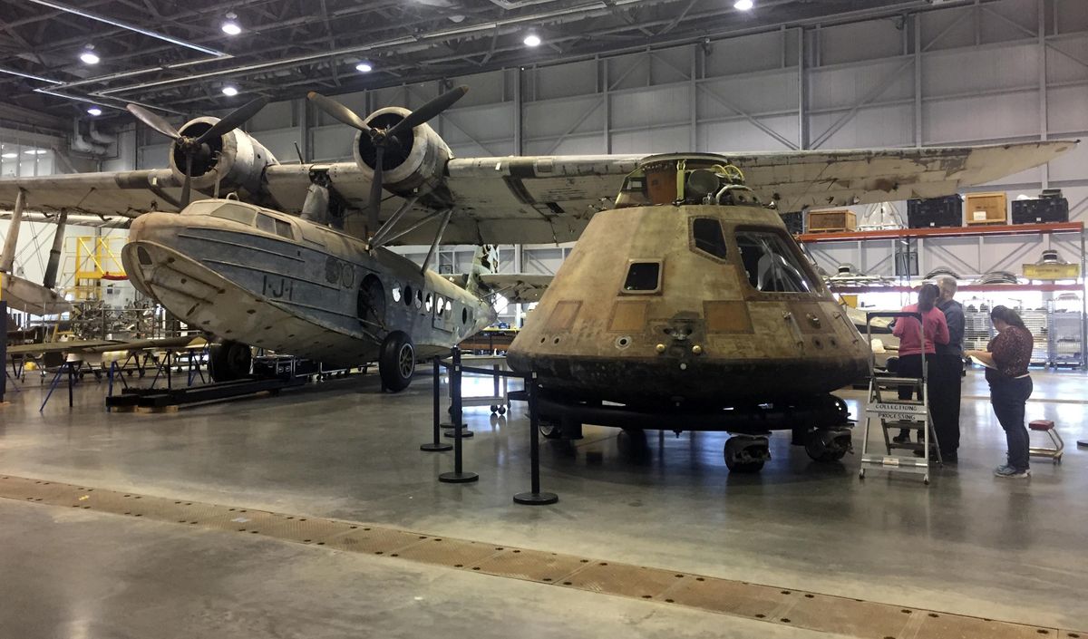 In this photo taken Feb. 17, 2017, the Apollo 11 capsule sits in the restoration hanger at the National Air and Space Museum